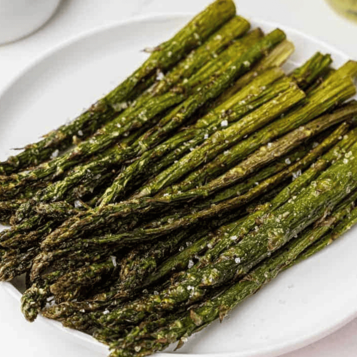 Air fryer asparagus cooked to perfection, golden and tender, ideal for a Weight Watchers-friendly side dish.