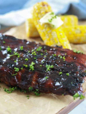 Blackstone Ribs grilling on the Blackstone griddle with a smoky glaze.