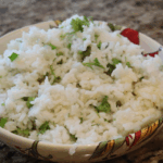 Chipotle Cilantro Lime Rice Recipe made in the Instant Pot, with fluffy rice, cilantro, and lime for a flavorful, easy-to-make side dish. Perfect for your next meal!