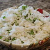 Chipotle Cilantro Lime Rice Recipe made in the Instant Pot, with fluffy rice, cilantro, and lime for a flavorful, easy-to-make side dish. Perfect for your next meal!