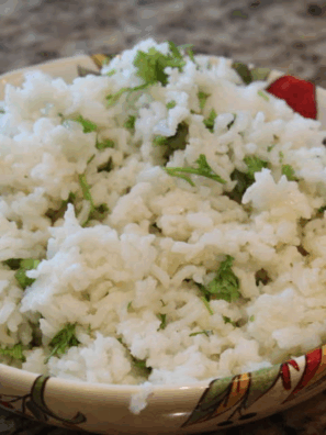 Chipotle Cilantro Lime Rice Recipe made in the Instant Pot, with fluffy rice, cilantro, and lime for a flavorful, easy-to-make side dish. Perfect for your next meal!
