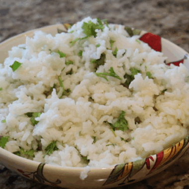 Chipotle Cilantro Lime Rice Recipe made in the Instant Pot, with fluffy rice, cilantro, and lime for a flavorful, easy-to-make side dish. Perfect for your next meal!