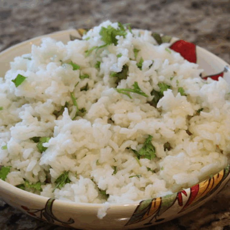 Chipotle Cilantro Lime Rice Recipe made in the Instant Pot, with fluffy rice, cilantro, and lime for a flavorful, easy-to-make side dish. Perfect for your next meal!
