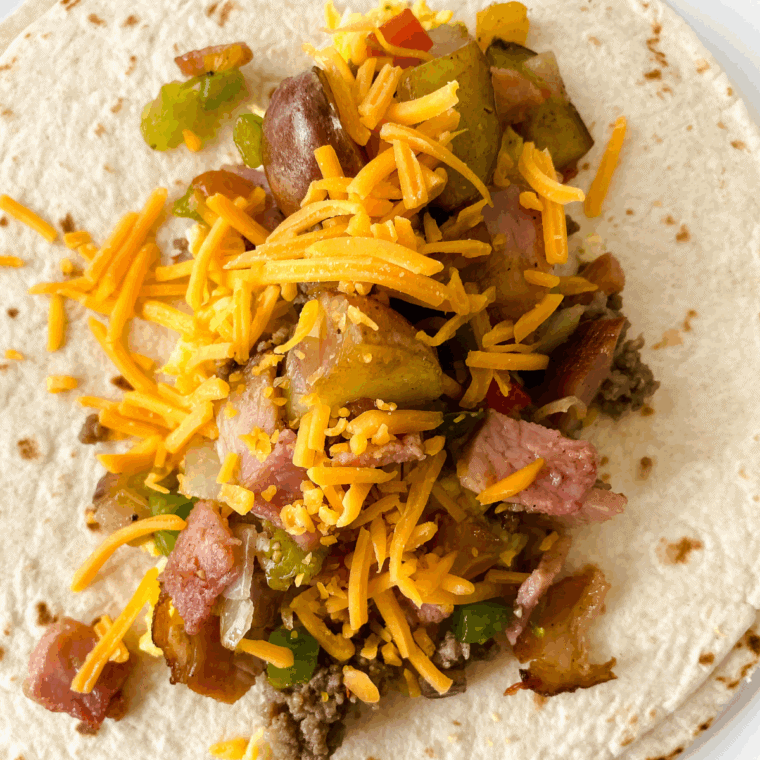 Add the ingredients on top of the tortilla burrito.