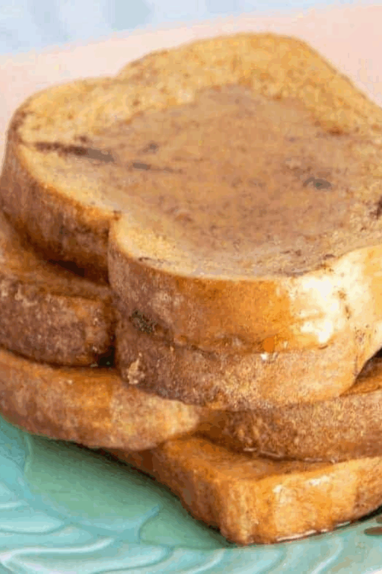 Plate of Copycat Cracker Barrel French Toast Recipe with syrup.