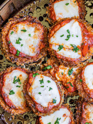 Cheesecake Factory eggplant parmesan with crispy breaded slices, marinara sauce, and melted mozzarella cheese