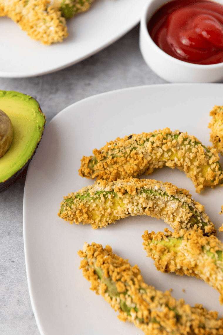 gluten-free air fryer avocado fries crispy and golden served with dipping sauce