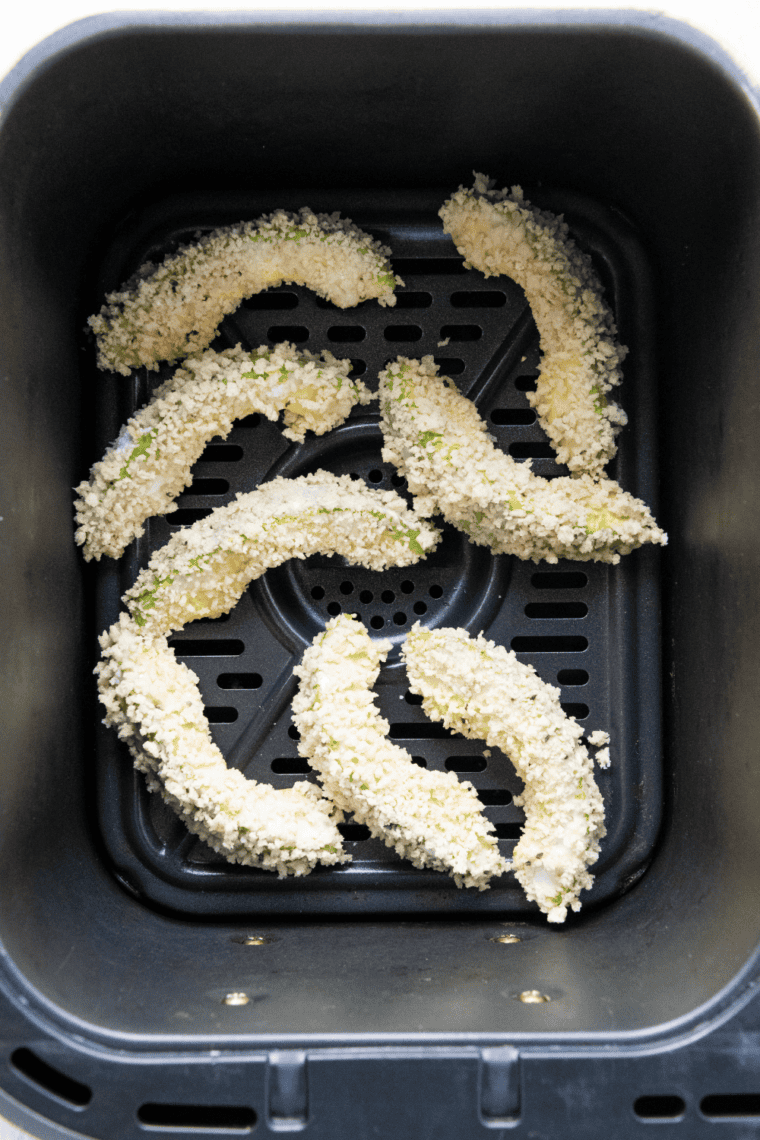 crispy gluten-free air fryer avocado fries served on plate with dipping sauce