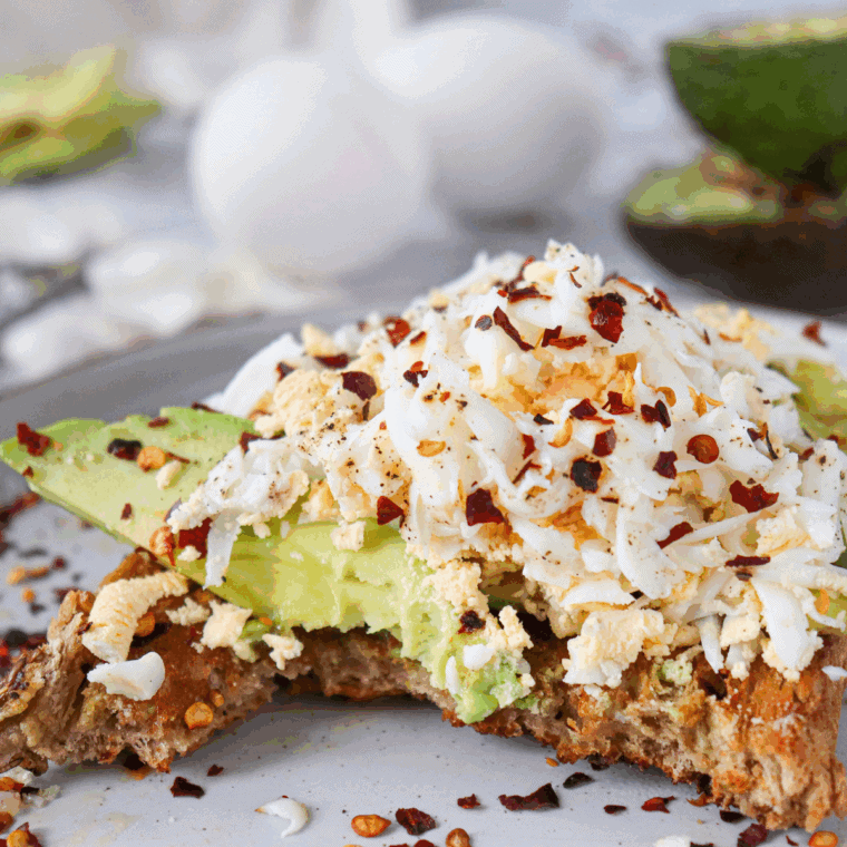 Air Fryer Grated Egg & Avocado Toast topped with creamy avocado and grated egg, served on crispy golden toast.
