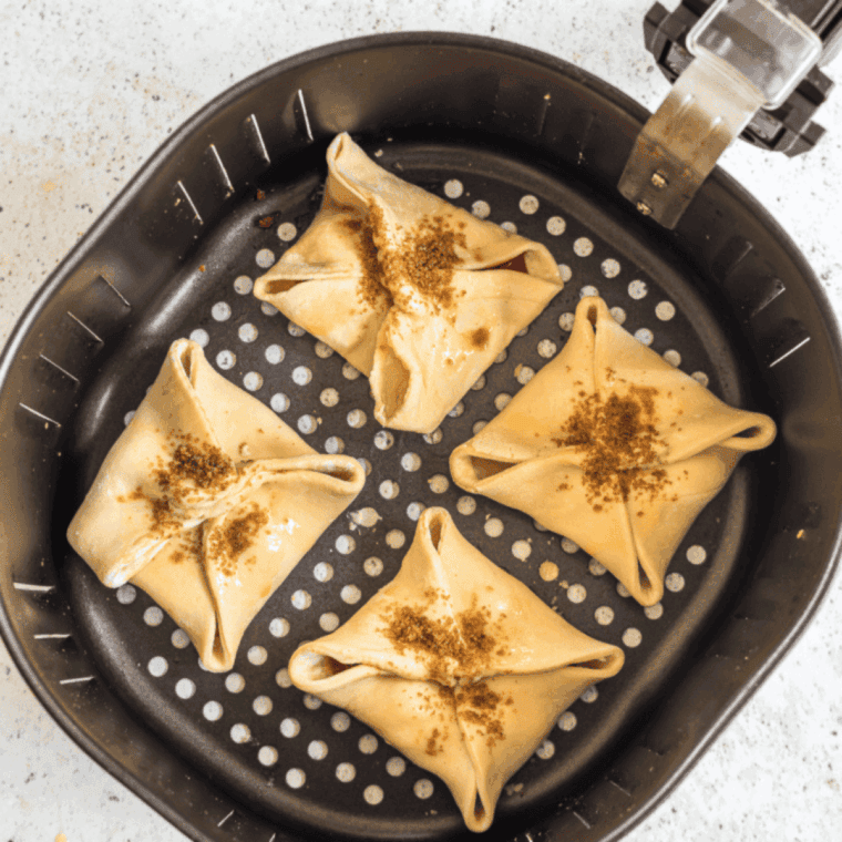 Place Homemade Arby's Cherry Turnovers in the air fryer basket.