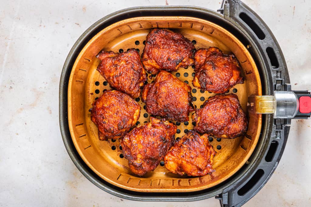 Air Fryer BBQ Chicken Thighs in Air Fryer Basket