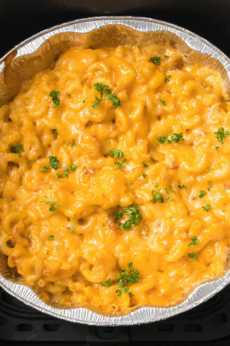 A bowl of creamy Outback Steakhouse Mac and Cheese topped with melted cheddar.