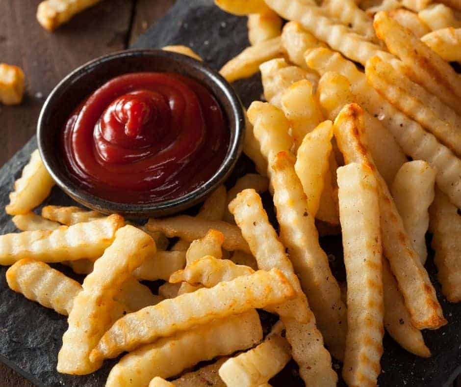 air fryer fries and dipping sauce on a platter