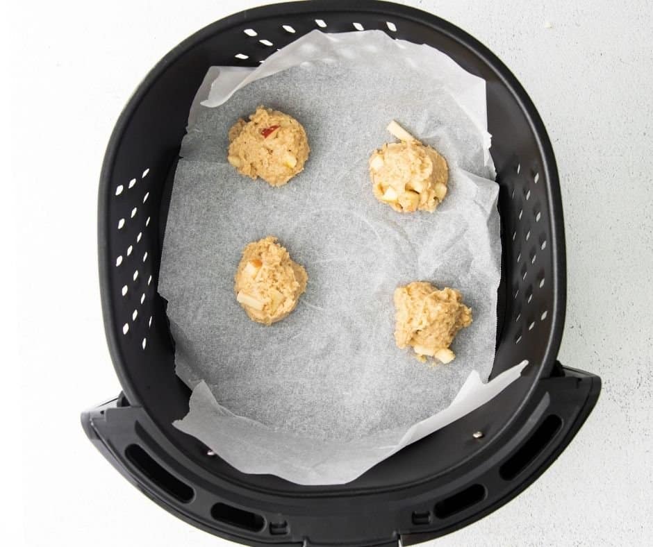 Air Fryer Apple Fritters in Air Fryer Basket