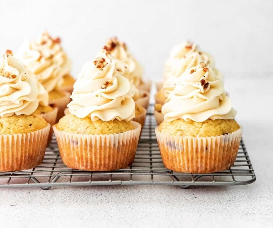 "Delicious Air Fryer Maple Pecan Cupcakes with a golden brown top.