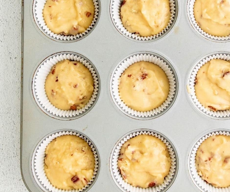 Fill the muffin tin about 3/4 way full with the maple pecan cupcake batter.
