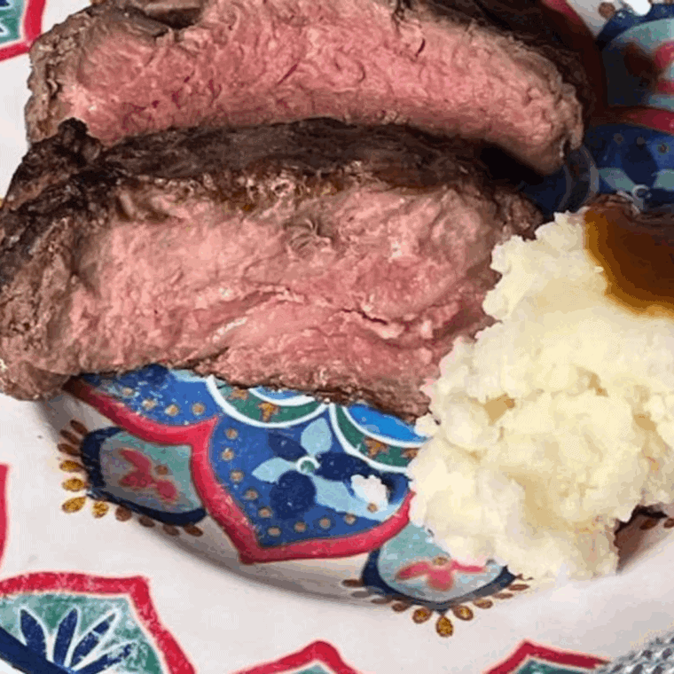 Air Fryer Roast Beef, tender and juicy on the inside, with a golden, crispy crust on the outside, making for a delicious and easy meal.