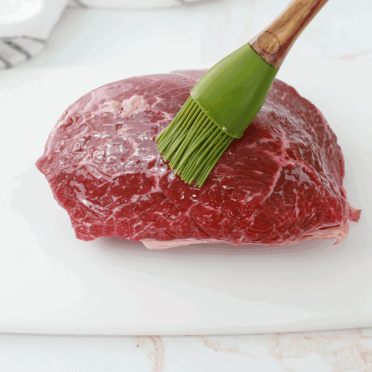 Rub the roast beef with olive oil.