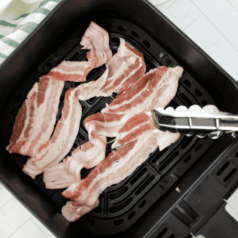 Place the bacon in the air fryer basket.
