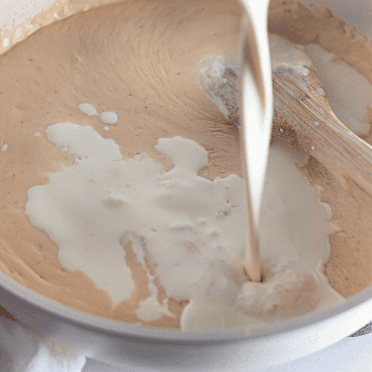 Melted butter and flour whisked into a smooth roux in a Dutch oven for copycat Costco mac and cheese.