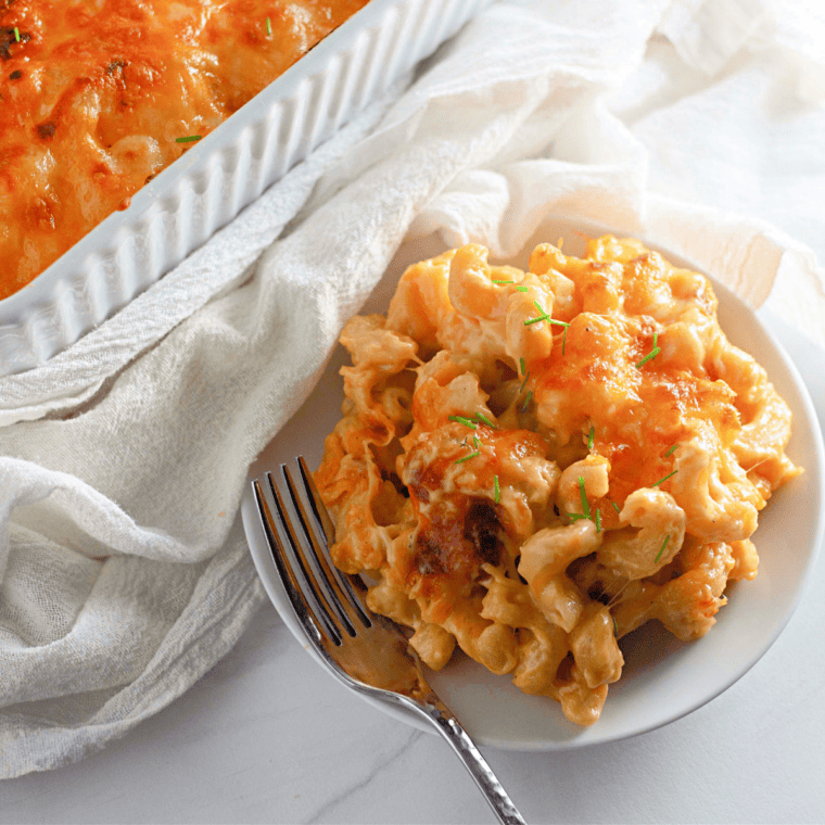 Close-up of copycat Costco macaroni and cheese with golden cheesy topping and elbow pasta