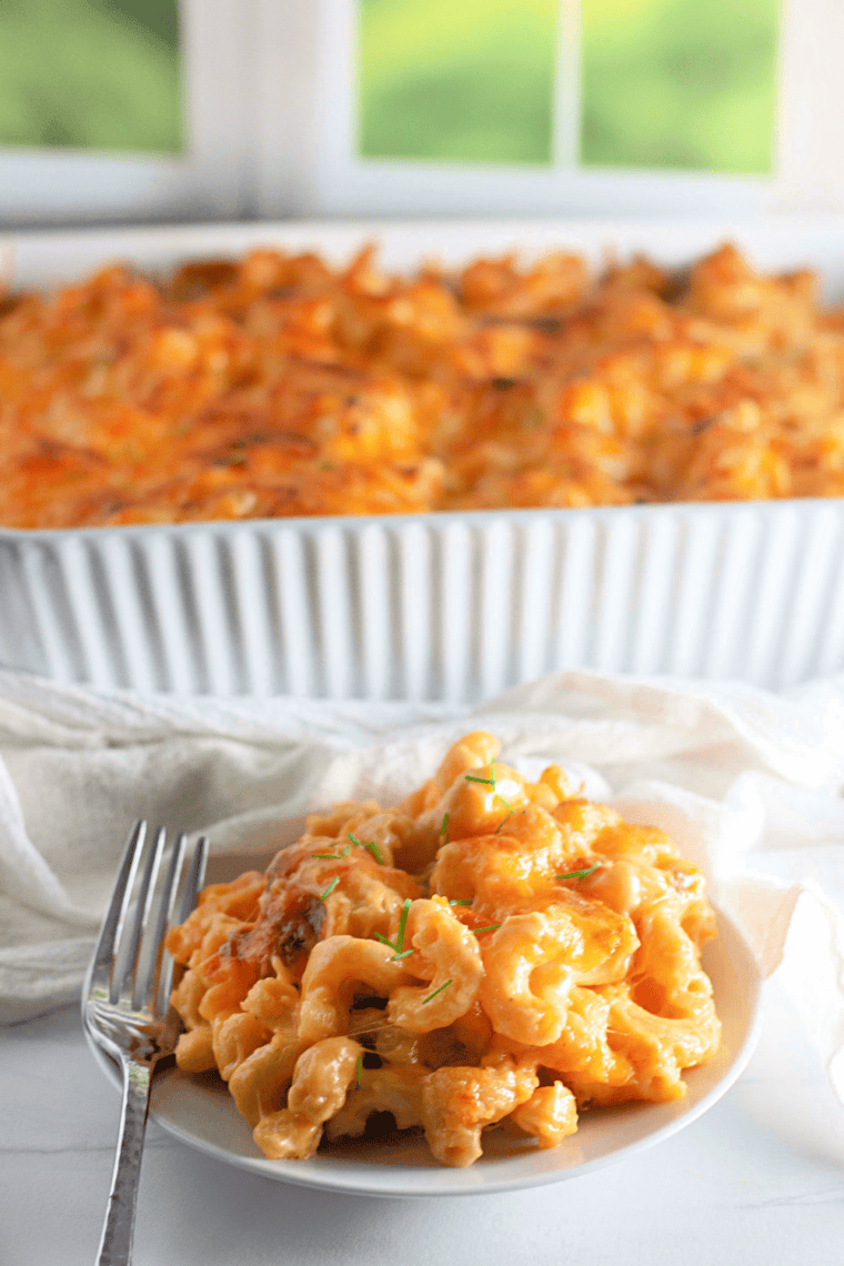 Copycat Costco mac and cheese resting in the baking dish before serving, ready to scoop