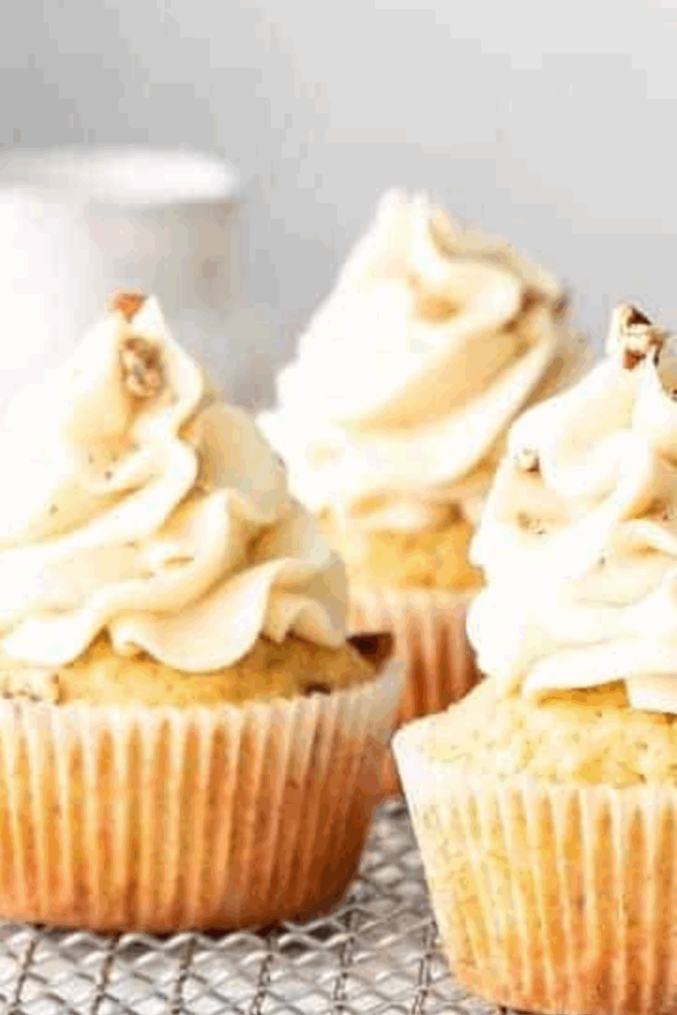 Moist dairy-free cupcakes topped with creamy vegan frosting and colorful sprinkles.