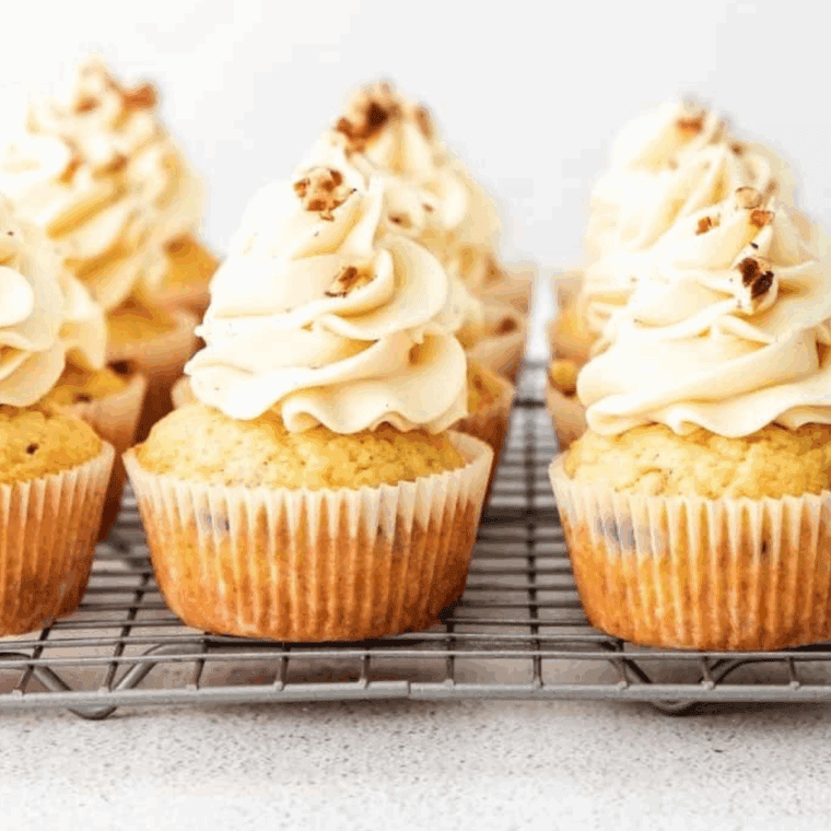 Moist dairy-free cupcakes topped with creamy vegan frosting and sprinkles