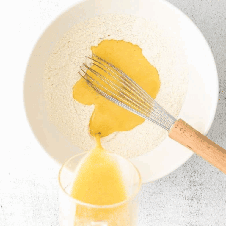In a large mixing bowl add the ingredients for your dairy free cupcakes.