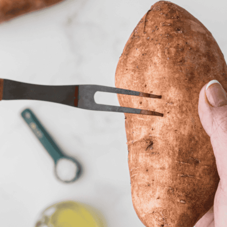 "Clean and prep sweet potatoes with olive oil and puncture holes before air frying."