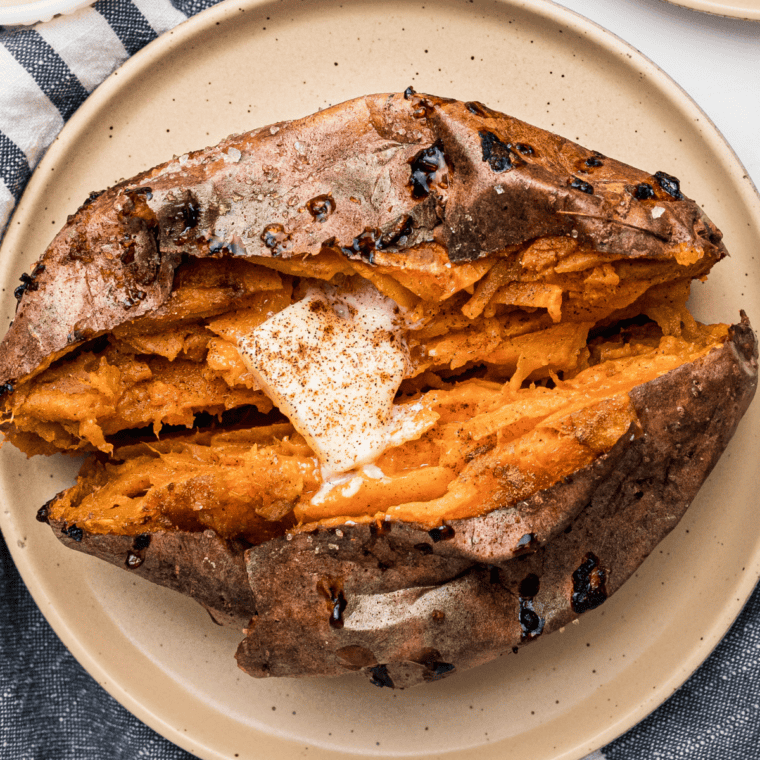 Longhorn Steakhouse-inspired sweet potato with cinnamon sugar topping, served as a perfect side dish."