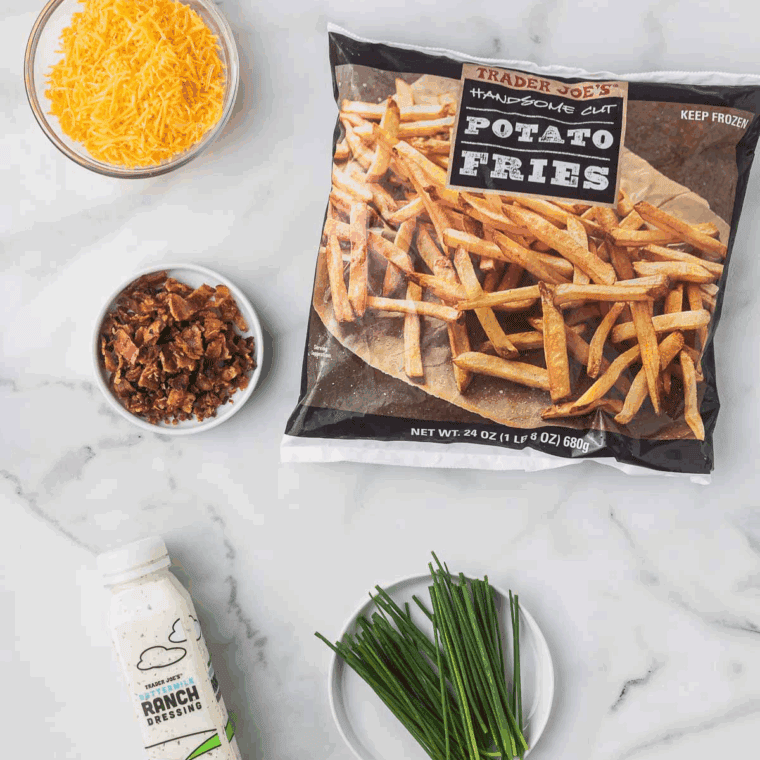 Ingredients needed for Texas Roadhouse Cheese Fries Recipe on kitchen table.