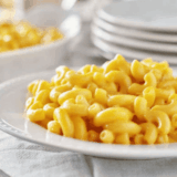 Copycat Costco mac and cheese with creamy cheddar sauce and elbow macaroni in casserole dish