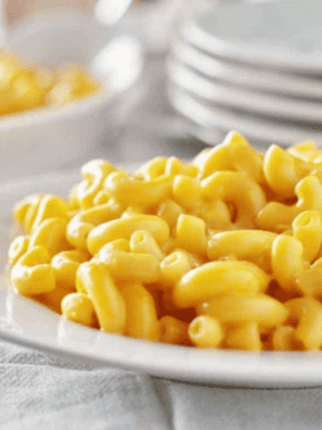 Copycat Costco mac and cheese with creamy cheddar sauce and elbow macaroni in casserole dish
