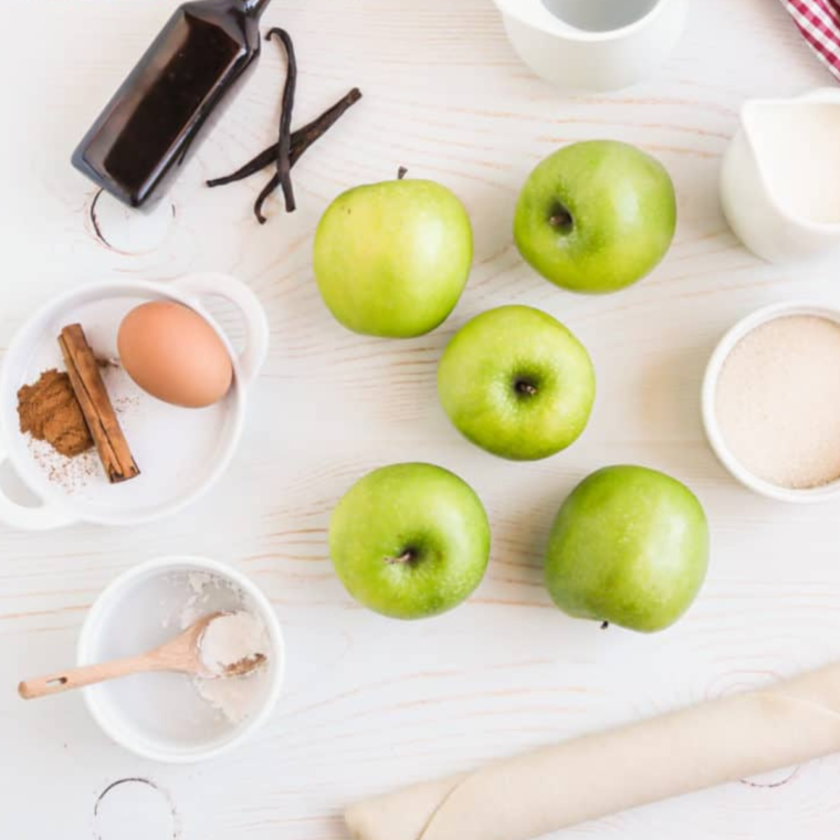 Ingredients needed for Air Fryer Apple Pie Baked Apples on kitchen table.