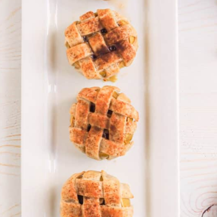 Air Fryer Apple Pie Baked Apples with cinnamon-sugar filling and a golden, crispy exterior.