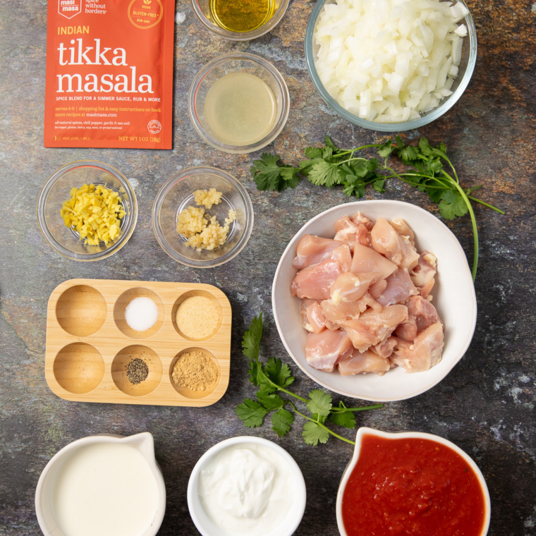 Ingredients needed for Easy Air Fryer Chicken Tikka Rice Bowl on kitchen table.