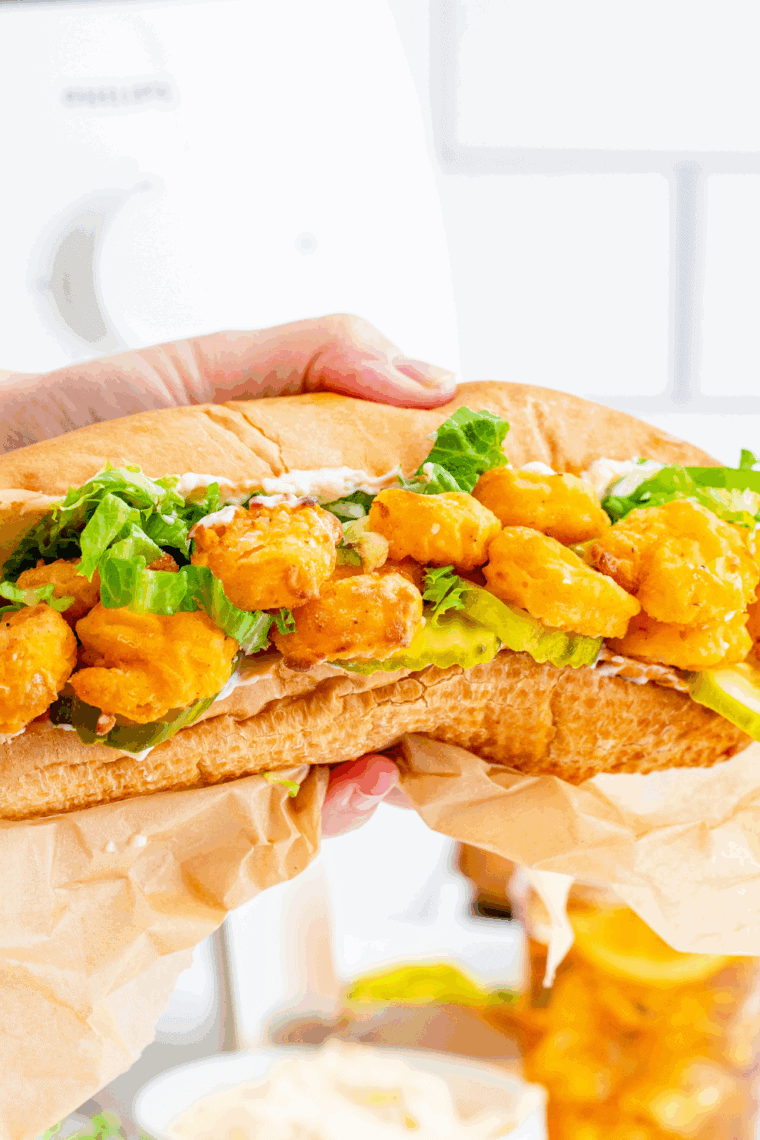 Arthur Treacher’s Po Boy Sandwich with fried fish and toppings on a toasted roll.









