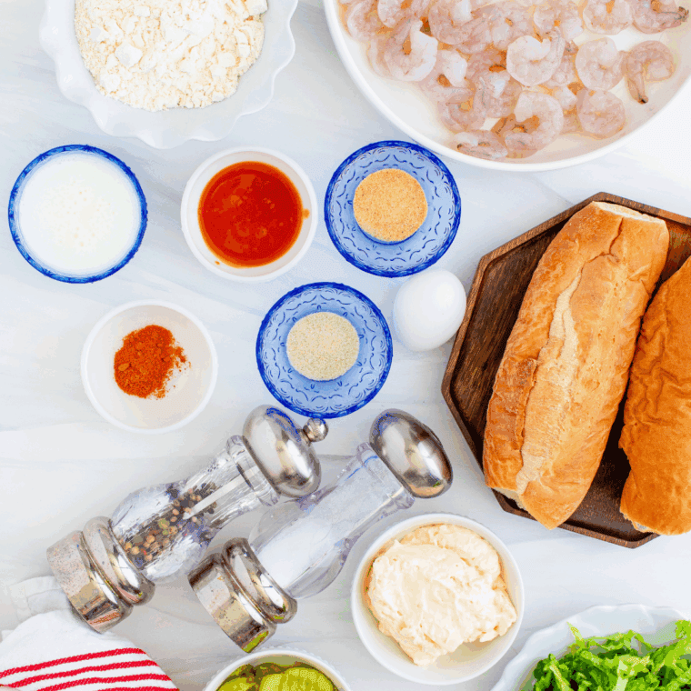 Ingredients needed for Arthur Treacher's Po Boy Sandwich on kitchen table.