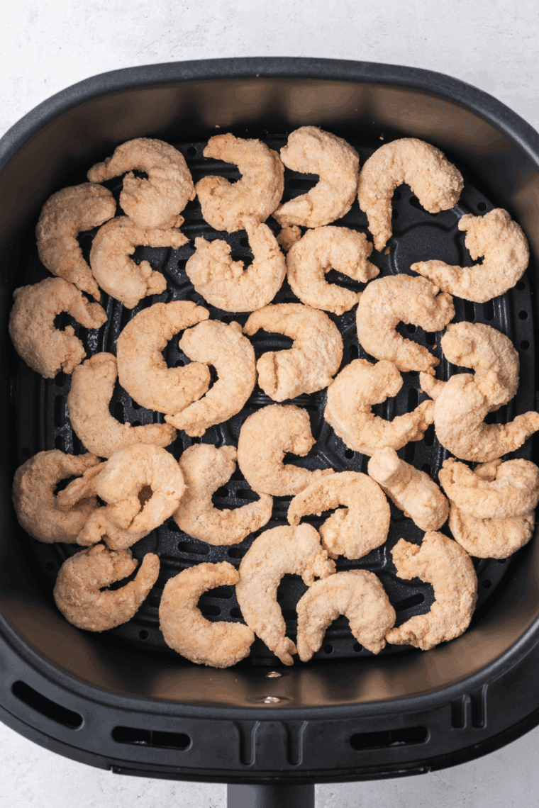 Frozen shrimp tossed with olive oil and taco seasoning until coated