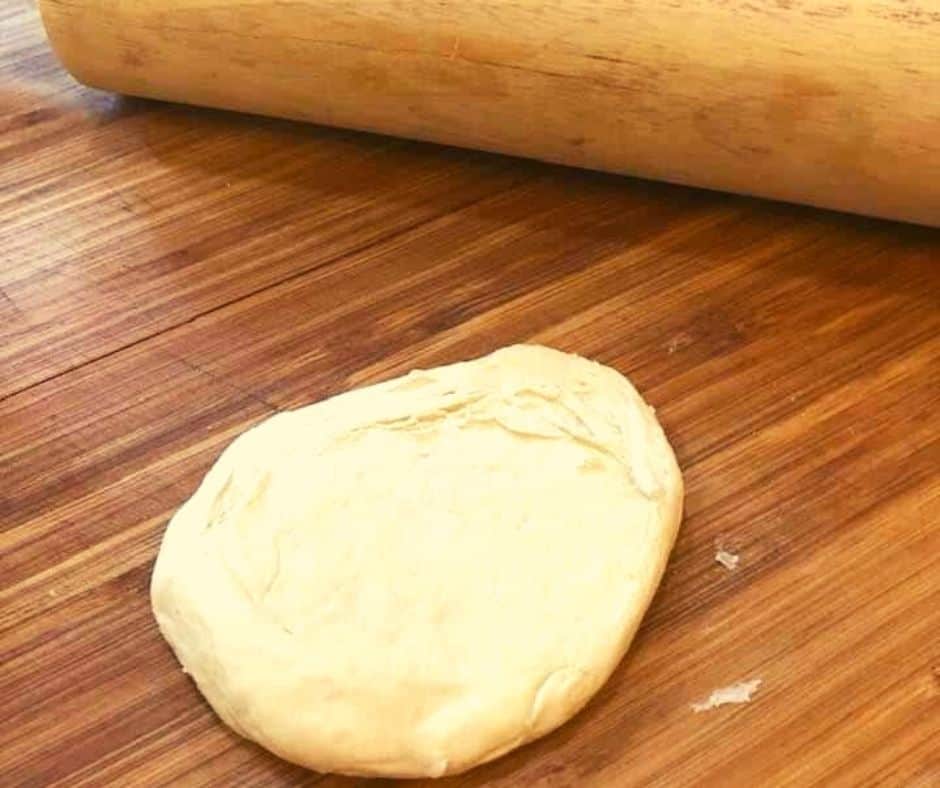 Flatten Biscuit Dough With Rolling Pin