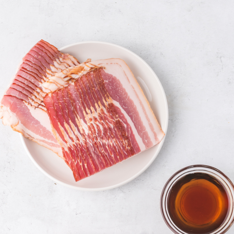 Ingredients needed for Air Fryer Bacon Wrapped Dates on table.