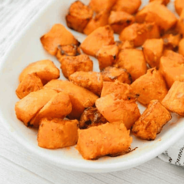Air Fryer Butternut Squash is slightly crispy on the outside and is fully tender inside. It makes an excellent side dish in less than 20 minutes this holiday season!
