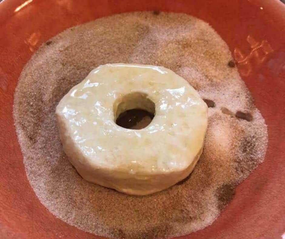 Air Fryer Cinnamon Sugar Donuts In Cinnamon Sugar Mixture