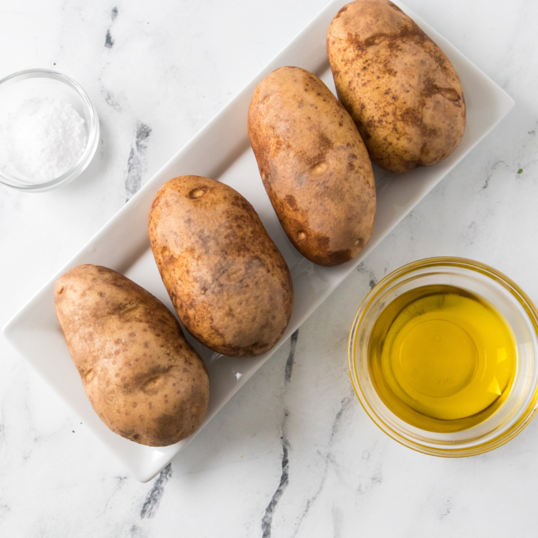 bake potato with sour cream ingredients on a table