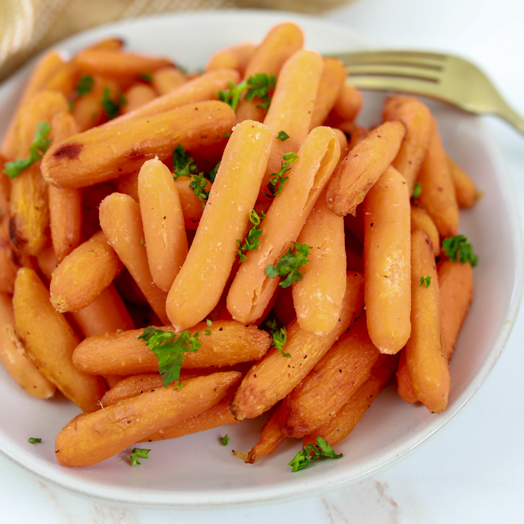 Air fryer Bob Evans carrots tossed in the leftover brown sugar butter glaze, ready to serve.