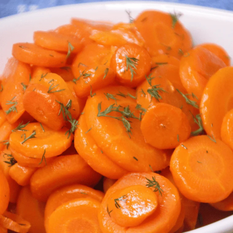 Texas Roadhouse-style cinnamon glazed carrots topped with parsley