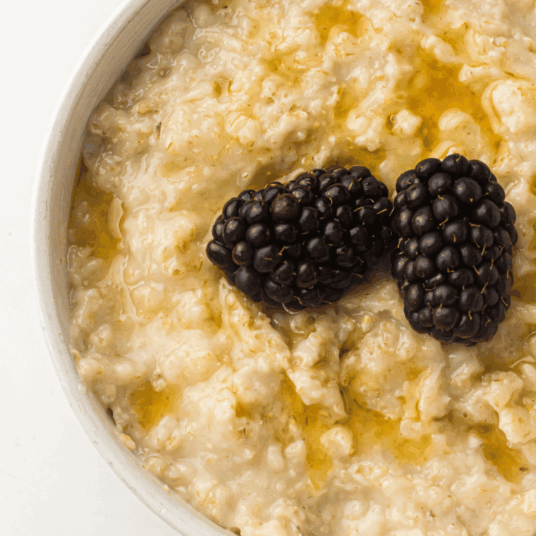 Bowl of Instant Pot Starbucks-style oatmeal topped with nuts and dried fruit