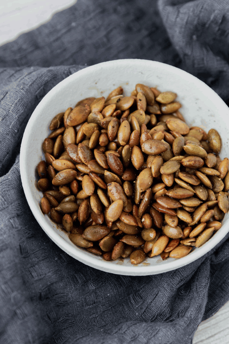 Golden, crispy roasted pepitas made in the air fryer for a quick and healthy snack.
