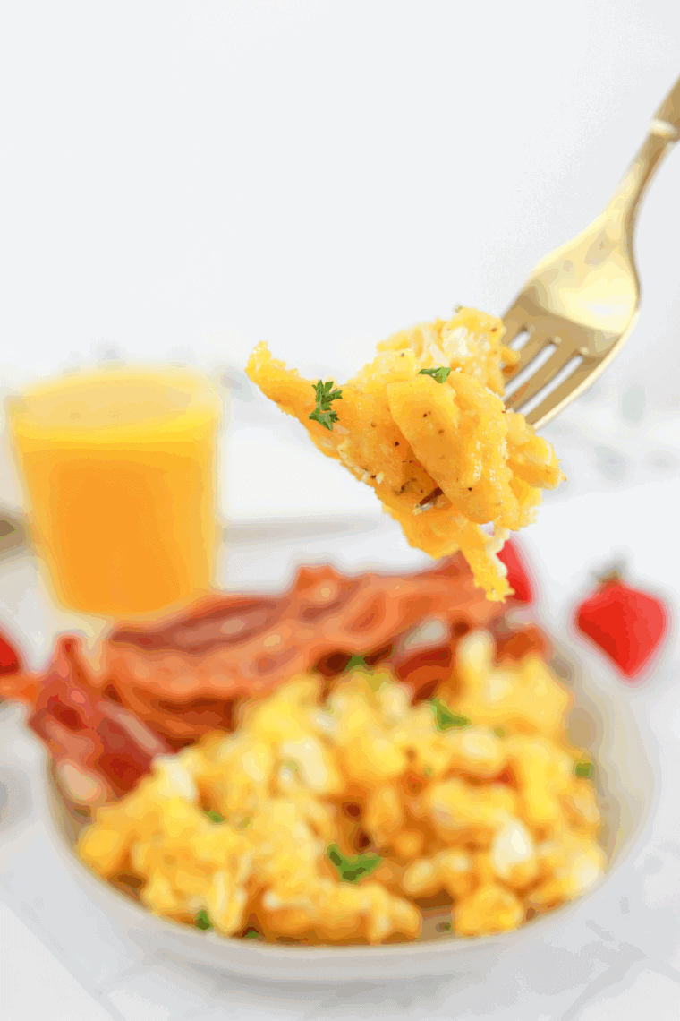 Creamy scrambled eggs cooked in an Instant Pot and served warm.